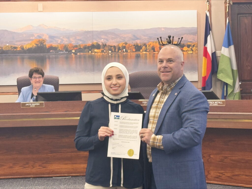 INN Team member accepting Loveland, CO Proclamation for Neurodiagnostic Week 